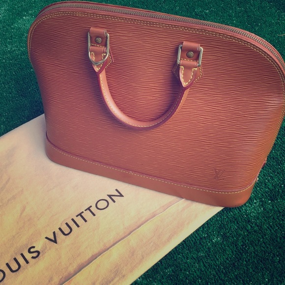 Louis Vuitton Handbags - LV Alma Epi leather. (Additional photos)